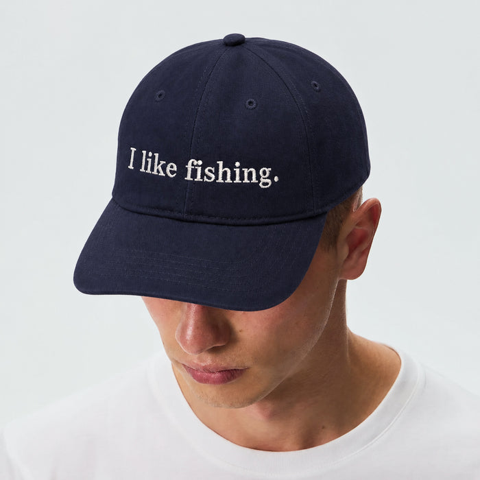 On-model, I like fishing. Midnight Blue dad cap